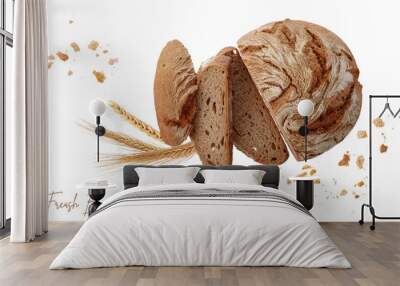 sliced loaf of fresh baked rye wheat bread with crumbs and spikelets closeup isolated on white Wall mural