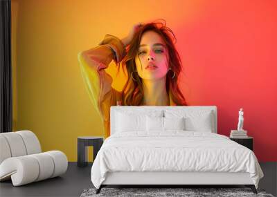 Stylish Young Woman in Trendy Clothes Against Vibrant Gradient Background, Fashionable Pose, Colorful Setting, Sunset Vibes, Modern Chic, Confident Look, Studio Shot Wall mural