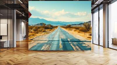 Vintage ROAD TRIP sign points towards a journey on an endless straight highway under a vast sky, invoking the spirit of adventure and the open road Wall mural