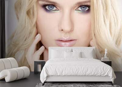 Young pretty woman with beautiful blond hairs Wall mural