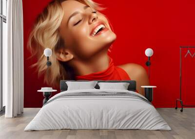 portrait of a blonde beautiful woman on a red background abstract	 Wall mural