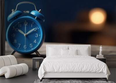 Blue Alarm Clock on Wooden Tabletop Wall mural