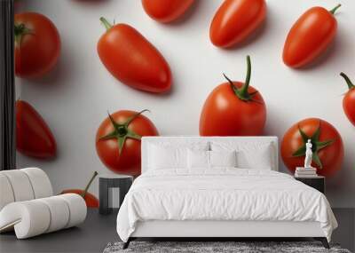 Close-up of various red tomatoes on a white background Wall mural