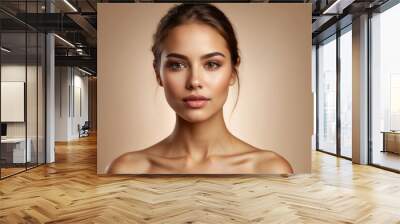 Close-up portrait of a woman with natural makeup and smooth skin Wall mural