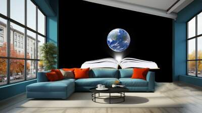 Book in the dark room with light and earth  - education concept Wall mural