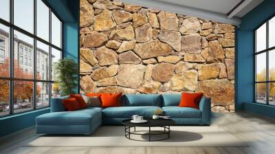 Old beige big stone wall background texture close up Wall mural