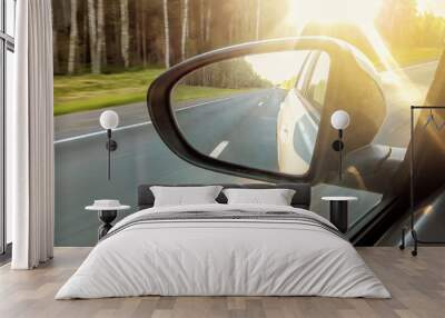 Speed car driving, view from the mirror on an empty highway, motion blur. Wall mural