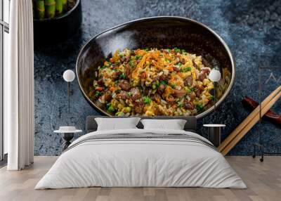 Fried rice with beef in Thai on dark stone table Wall mural