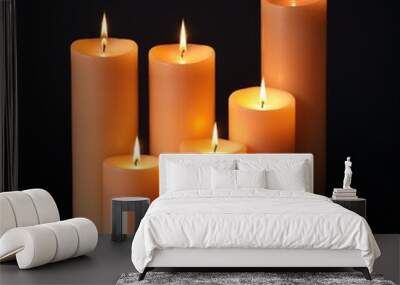  burning candles on black background Wall mural