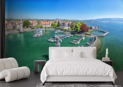 Harbor on Lake Constance with statue of lion at the entrance in Lindau, Bavaria, Germany Wall mural