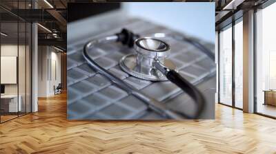 stethoscope on a laptop keyboard Wall mural