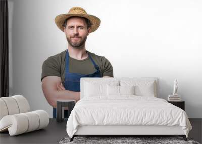 caucasian farmer in hat and apron isolated on white background. copy space Wall mural