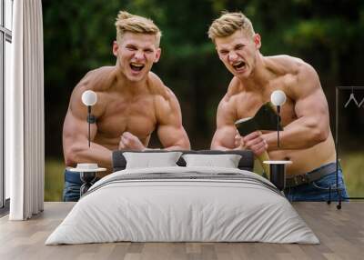 double force power. Masculinity and brutality concept. Men with sexy muscular torsos look brutally. Achieving success in sport. mesomorph. twins muscular men with axe. athletic man use ax Wall mural