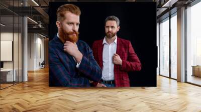 elegant men wearing menswear, copy space. studio shot of two men in menswear jackets. Wall mural