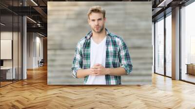 making man look his best. young man. handsome man urban outdoors. unshaven man in casual style. mens Wall mural