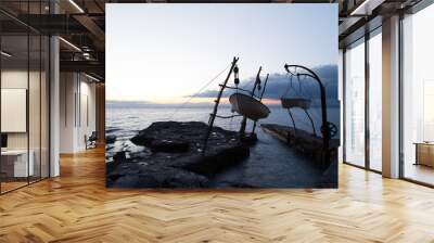 two boats in mediterranean sea lifted for repair Wall mural