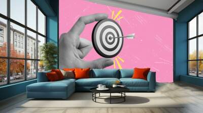 Contemporary art collage art depicting a hand holding a target. Wall mural