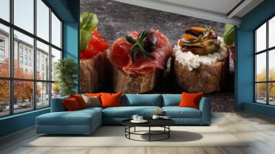 Appetizers table with italian antipasti snacks and wine in glasses. Brushetta or authentic traditional spanish tapas set, cheese variety Wall mural