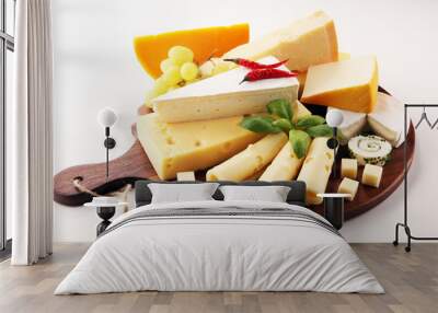 Cheese plate served with grapes, various cheese on a platter Wall mural