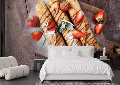 Crepes with jam, berries and sugar powder. Homemade pancakes, delicious breakfast. Wall mural