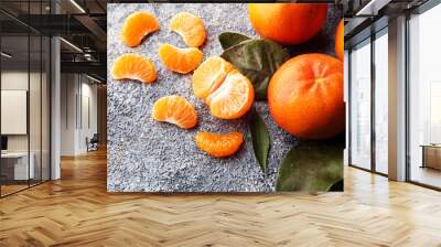 fresh ripe tangarines, food closeup on grey background. Wall mural