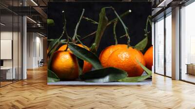 fresh ripe tangarines, food closeup on grey background Wall mural