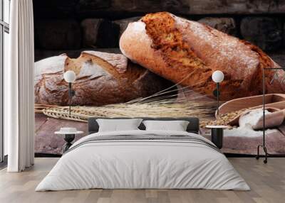 Freshly baked bread and flour in a bakery concept set. Wall mural