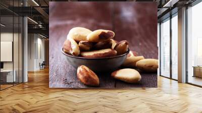 Para nuts on a rustic wooden table and para nuts in bowl Wall mural