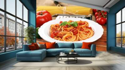 Plate of delicious spaghetti Bolognaise or Bolognese with savory minced beef and tomato sauce garnished with parmesan Wall mural