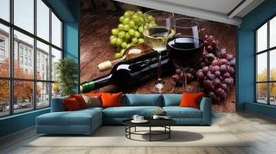 Red Wine bottle and white wine with grapes and glasses on wooden background Wall mural