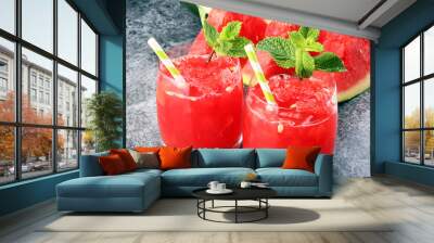 Tasty fresh appetizing watermelon drink smoothie. Watermelon drink in glasses with slices Wall mural