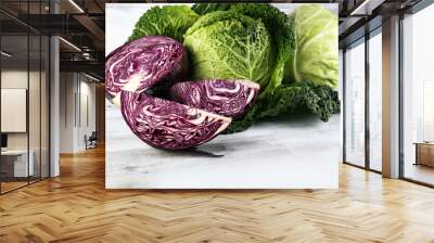 Three fresh organic cabbage heads. Antioxidant balanced diet eating with red cabbage, white cabbage and savoy Wall mural