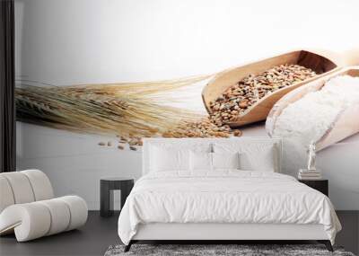 Whole grain wheat flour and seeds on white background. Wall mural