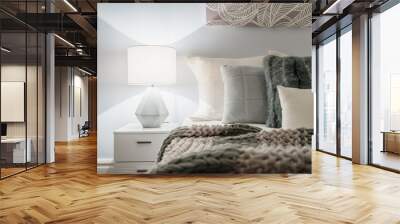 Modern home interior with bedroom setting including bedside table with lamp. Wall mural