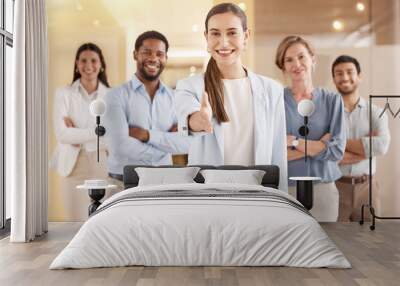 Have a great day full of productivity and positivity. Portrait of a young businesswoman extending a handshake in an office with her colleagues in the background. Wall mural