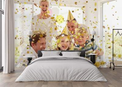 Kids happy birthday party, confetti surprise and family home with cake, celebration and happiness in Australia house together. Excited children, smile parents and grandparent celebrate special event Wall mural