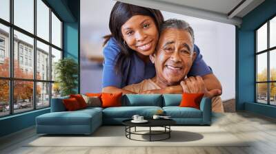 Nurse hug, healthcare and senior man with medical support from doctor, consulting for health and happy in communication during retirement. Portrait of sick person with trust in worker in house Wall mural