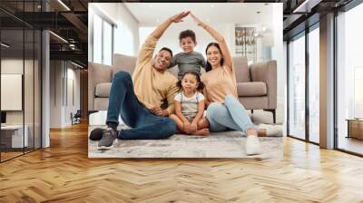 Roof, children and parents with security in their house with love, care and safety in the living room together. Portrait of happy, smile and young mother and father with insurance for their family Wall mural