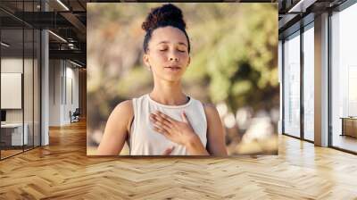 Yoga, meditation and fitness with a black woman breathing for calm exercise outdoor in a nature park. Wellness, health and meditate with a female yogi finding peace, balance or zen alone outside Wall mural