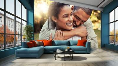 Love, black couple and hug being happy with smile, relax and being confident for marriage, relationship and together outdoor. Romance, man and woman enjoy holiday, embrace and holding for anniversary Wall mural