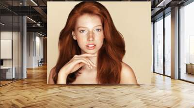 Beauty Freckles young girl portrait. Attractive model with beautiful natural ginger red hair Wall mural