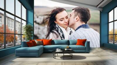 Romantic happy couple enjoy spending time together outdoor. Wall mural