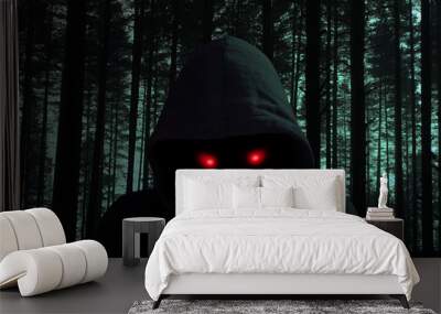 Dark man with hoddie in black forest red eyes Wall mural