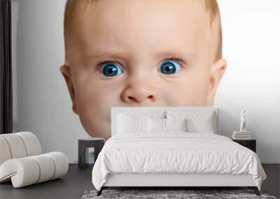 Sad little baby isolated on a white background. Wall mural