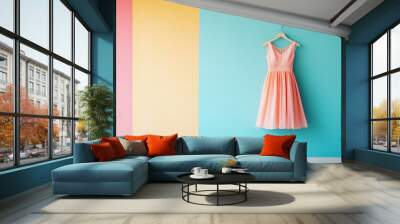 A stylish dress hanging on a rack with a vibrant fashion background, leaving room for text Wall mural