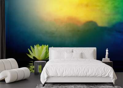 Lotus flower with sunrise background. Wall mural