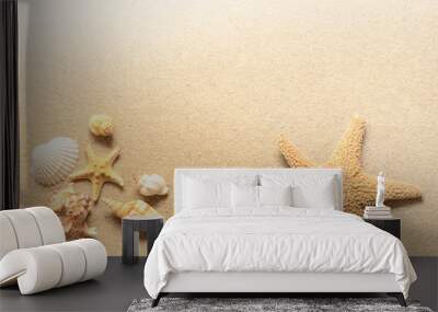 Summer beach. Starfish and seashell on the sand. Wall mural