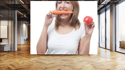 Beautiful woman with apple and carrot isolated on white backgrou Wall mural