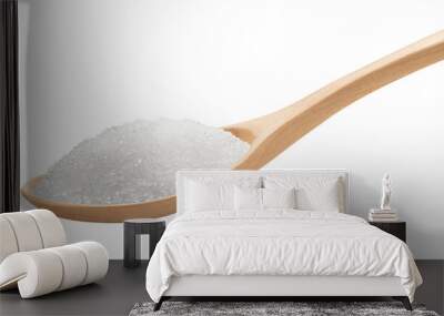 heap of sugar with distinguishable crystals in a wooden spoon isolated on white. Wall mural