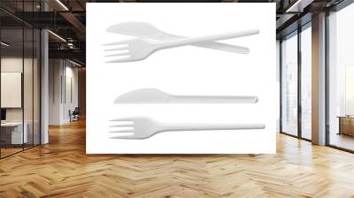 Plastic knife and fork isolated on white background Wall mural